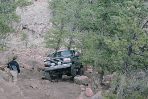 1996 Ford Bronco - And slid right off again, notice the rubber building up on top of the drivers side rock. Stupid SSR's...