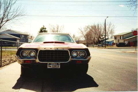 1972 Ford Ranchero - A 1972 Ford Ranchero is parked on a residential street, its distinctive front-end design.