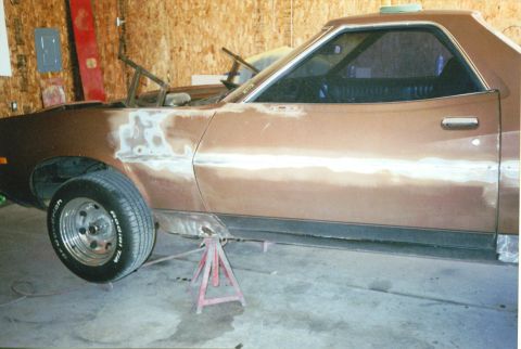 1972 Ford Ranchero - This 1972 Ford Ranchero is in the process of body repair, with visible filler on its side.