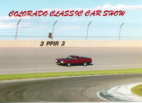 1972 Ford Ranchero - Colorado Classic Car Show features a red 1972 Ford Ranchero driving on a racetrack.
