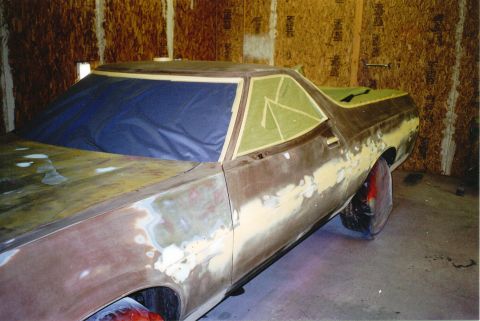 1972 Ford Ranchero - This 1972 Ford Ranchero is undergoing bodywork, showing primer and rust before its final paint job.