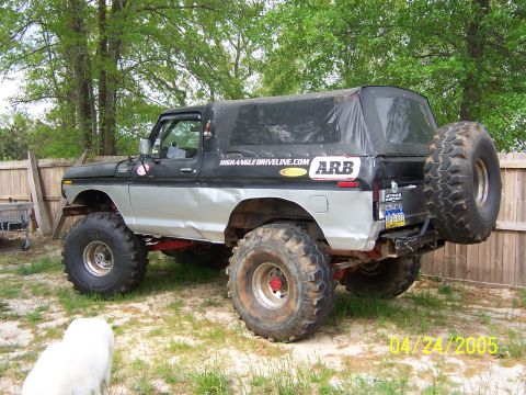 1978 Ford Bronco - This modified Ford Bronco features a soft top and is equipped with large off-road tires.