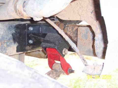 1978 Ford Bronco - Close-up of a shackle flip kit installed on the rear suspension of a vehicle. The date 04/25/2005 is visible.