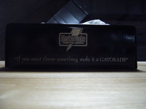 1988 Ford Bronco - A black tissue box with the Gatorade logo and a motivational quote is displayed on a wooden surface.
