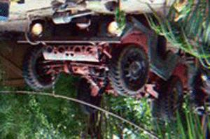 1968 Ford Mustang - This Jeep CJ-5 is seen from the front, with its off-road tires and red body prominent.