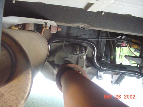 2002 Ford Excursion - Underside view of a 2002 Ford Excursion showing the rear axle and sway bar installation.