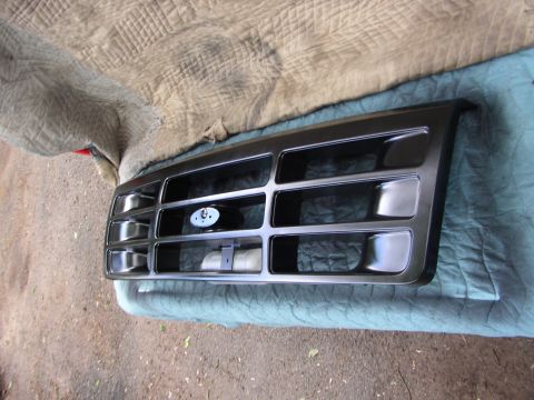 1995 Ford Bronco - Front grille assembly for a 1995 Ford Bronco, showing the Ford emblem.