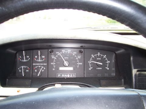 1995 Ford Bronco - Interior view of a 1995 Ford Bronco's dashboard, showing various gauges and the steering wheel.