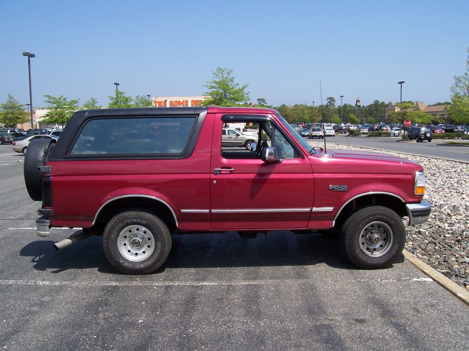 Red 1995 Ford Bronco side view