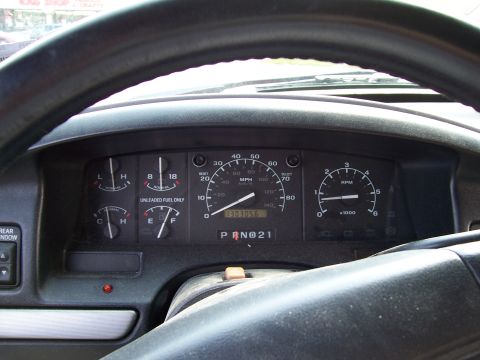 1995 Ford Bronco - Interior view of a 1995 Ford Bronco's dashboard, displaying the odometer reading of 130,305 miles.