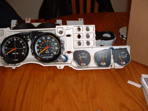 1978 Ford Mustang II - Instrument cluster with gauges including tachometer, speedometer, fuel, alternator, and temperature.