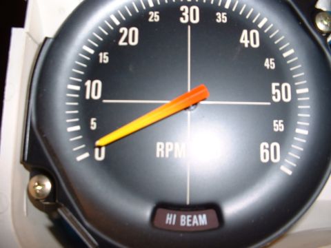 1978 Ford Mustang II - The tachometer shows RPMs and includes a HI BEAM indicator light, typical of older vehicle interiors.