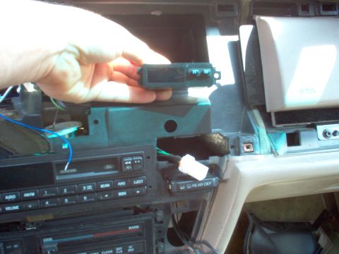 1994 Ford Crown Victoria - While removing the dash finisher, I noticed a possible new location for the clock, so I did some rough cutting to test fit it.