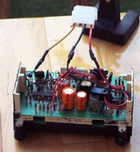 1985 Ford Crown Victoria LTD - Close-up of an electronic control module with visible circuitry, capacitors, and wiring.