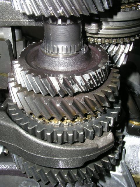 1996 Ford Probe - Damaged transmission gears show significant wear and chipping on the teeth.