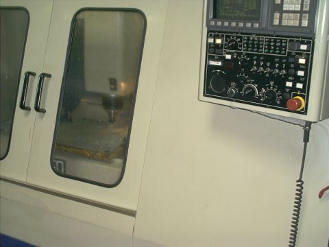 1966 Ford Bronco - Close-up of an industrial machine's control panel, numerous buttons and dials.