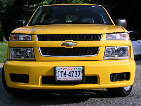 2005 Chevrolet Colorado - Front view of a yellow Chevrolet Colorado pickup truck with a Virginia license plate showing a 2006 sticker.