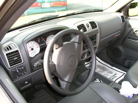 2005 Chevrolet Colorado - The dashboard of a 2005 Chevrolet Colorado Xtreme shows the speedometer and tachometer with 'Xtreme' branding.