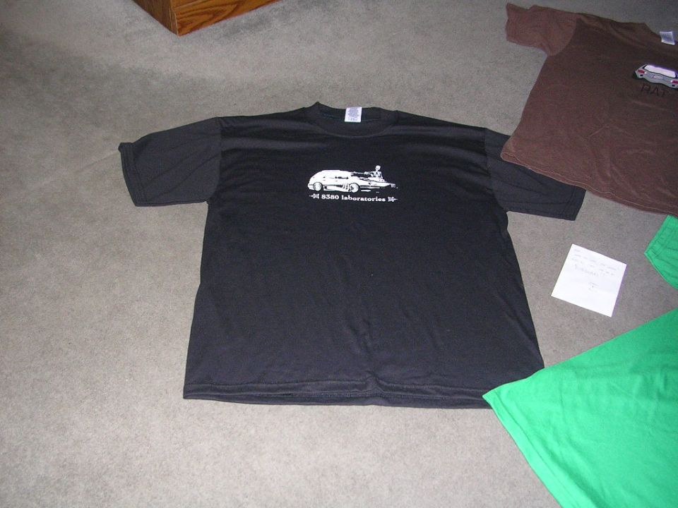 Black t-shirt graphic of a classic car with text "-M B580 laboratories-"