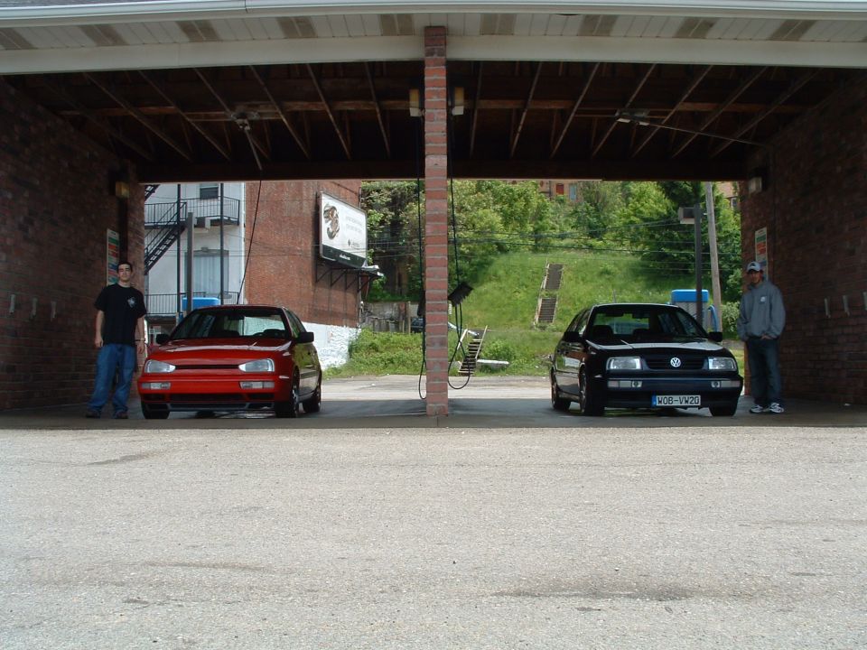 Red and black 1994 Volkswagen Jettas parked front view