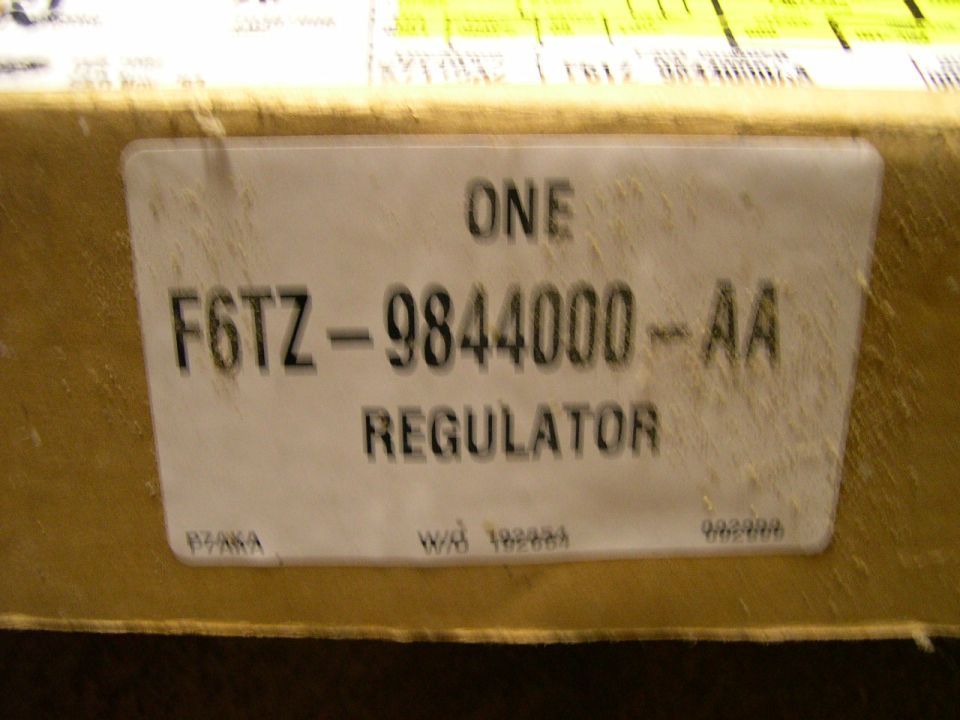 Part label with text F6TZ-9844000-AA REGULATOR and SUPERMOTORS logo