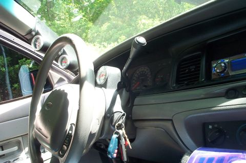 1999 Ford Crown Victoria - Interior view of a 1999 Ford Crown Victoria, aftermarket gauges and a modified dashboard.