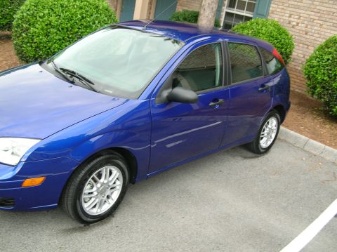 2005 Ford Focus - This blue 2005 Ford Focus hatchback is shown from a 3q front angle.