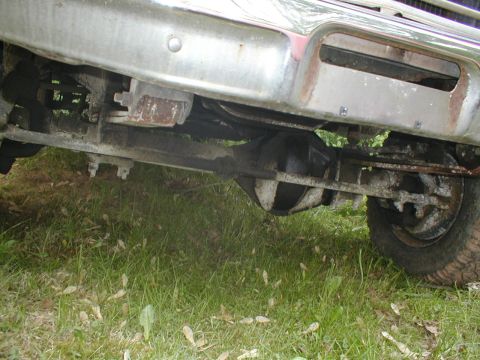 1979 Ford Bronco - Undercarriage view of a 1979 Ford Bronco, showing the rear axle and differential.