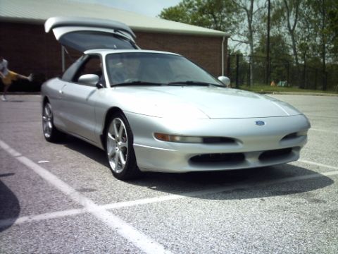 1995 Ford Probe - This 1995 Ford Probe is parked in a lot with its rear hatch open.