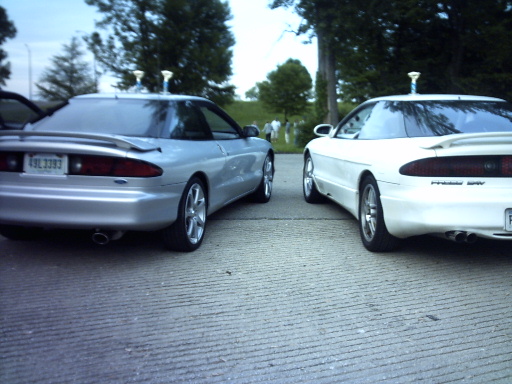 Silver 1995 Ford Probe rear view, white 1995 Ford Probe rear view