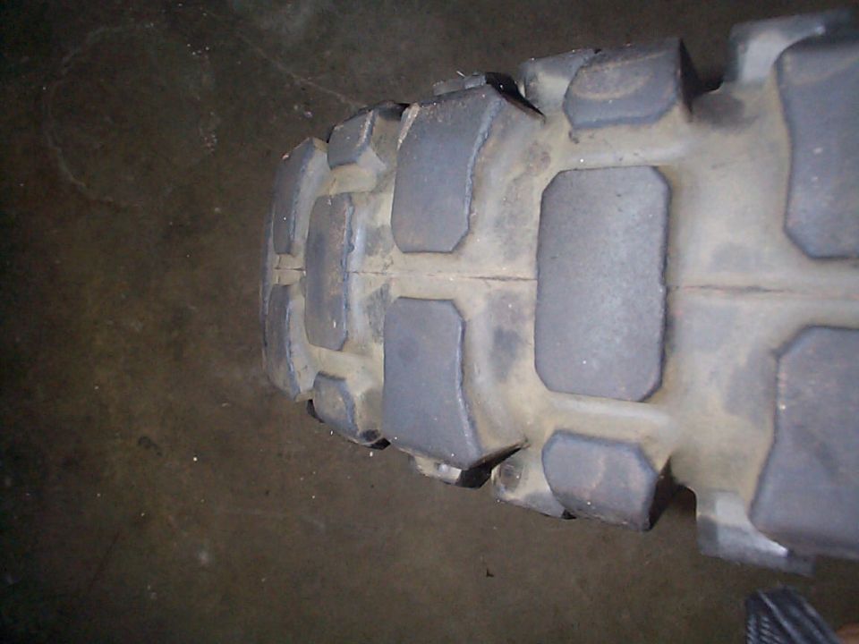 Close-up of a knobby motorcycle tire tread