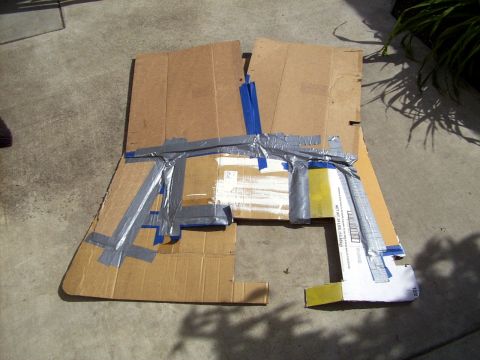 1978 Ford Mustang II - A homemade structure made of cardboard and duct tape sits on a concrete surface.