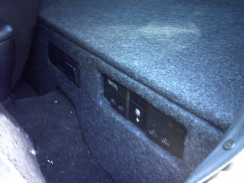 1995 Ford Probe - Custom car audio installation with multiple components visible in the interior.