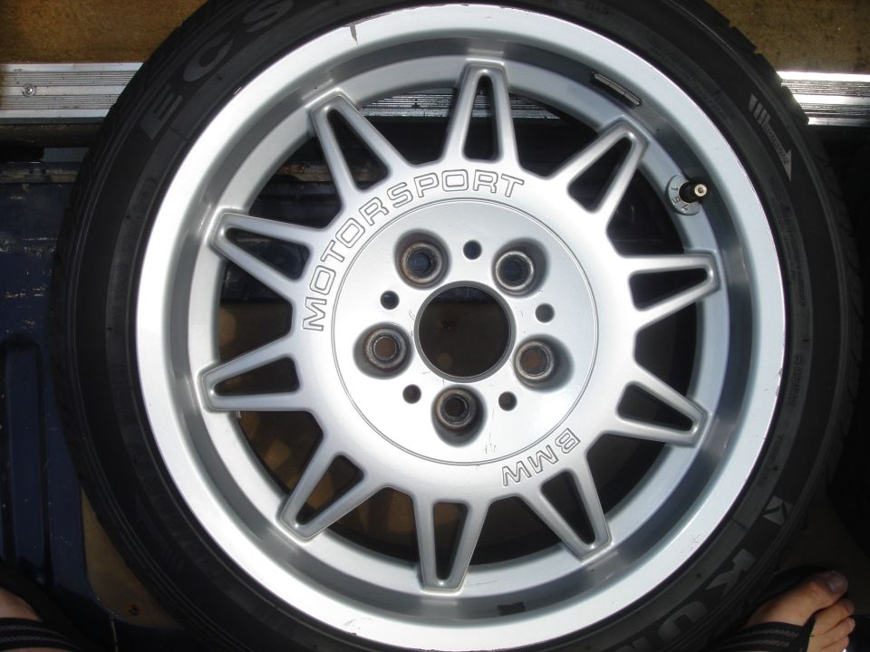 Silver BMW Motorsport alloy wheel face stamped MOTORSPORT and BMW