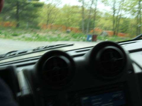 1998 Ford Taurus - Interior view of a car's dashboard, showing air vents and a portion of the steering wheel.