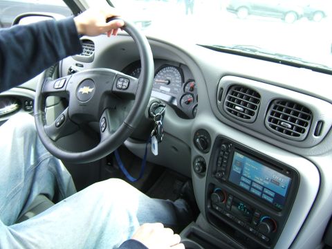 1998 Ford Taurus - Driver's perspective inside a Chevrolet Trailblazer, focusing on the dashboard and controls.