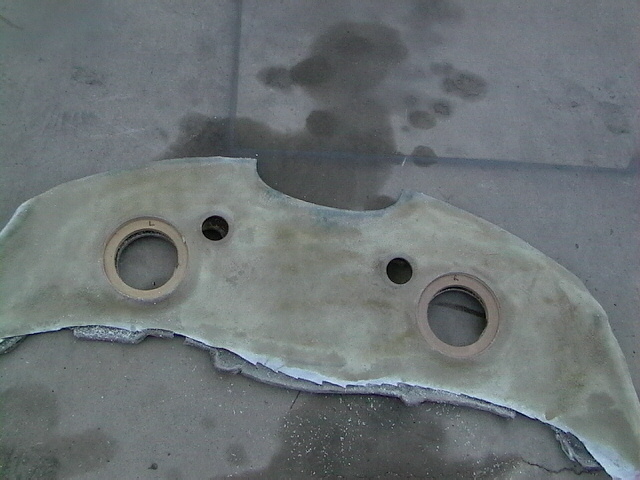Custom fiberglass panel with two large circular openings and two smaller holes