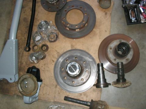 1995 Ford Bronco - Hard to tell here, but the 8 lug 3/4T chevy hub and rotor is beefier, as evidenced by it weighing in at about 5 lbs. more than my 1/2T. TTB…