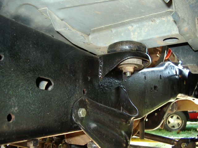 Frame and suspension mount with another vehicle in background
