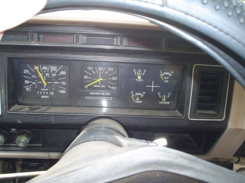 1981 Ford Bronco - The dashboard of a 1980s Ford truck displays various gauges, including a speedometer and tachometer.