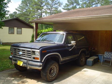 1981 Ford Bronco - This 1981 Ford Bronco is parked under a carport, showing its front 3/4 profile.