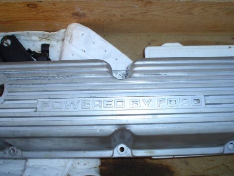 1981 Ford Bronco - A close-up view of a silver valve cover clearly displaying the "POWERED BY FORD" inscription.