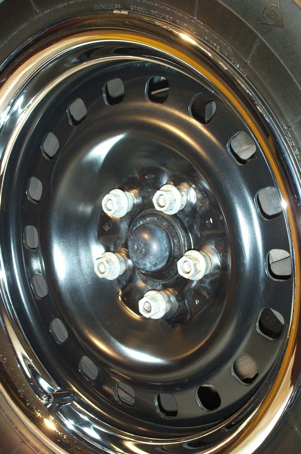 Note the special "collared" lugnuts required to hold the centercap in place.