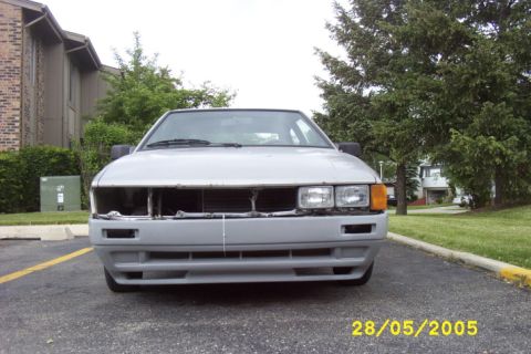 1983 Volkswagen Scirocco - Front view of a gray 1983 Volkswagen Scirocco with damage to the front end.