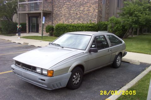 1983 Volkswagen Scirocco - This 1983 Volkswagen Scirocco is parked in a lot, showing its distinctive hatchback body style and grey front bumper.