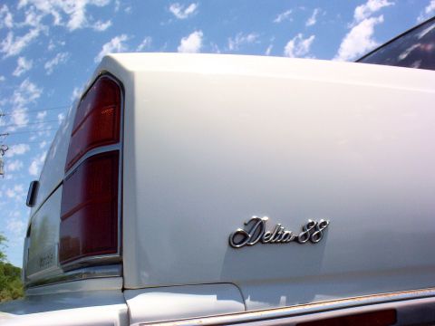 1995 Mercury Sable - Delta 88 badge.