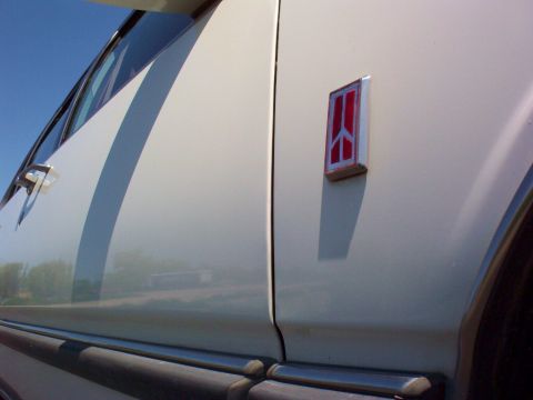 1995 Mercury Sable - Oldsmobile "Rocket" emblem.