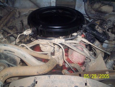 1984 Ford Bronco II - Close-up view of an engine bay, the air cleaner assembly and various hoses. A date stamp indicates the photo was taken on May 28, 2005.