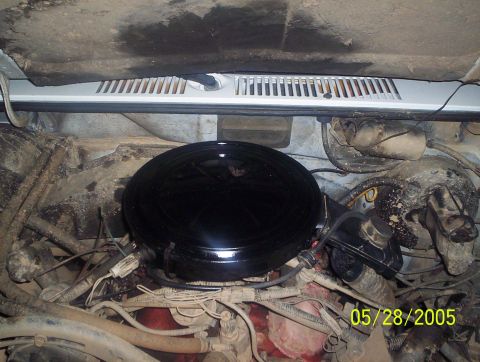 1984 Ford Bronco II - Close-up view of a vehicle's engine compartment, showing various mechanical components and wiring.