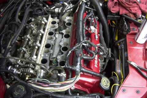 1997 Ford Taurus - The engine's internal components are exposed for maintenance or repair, revealing the camshafts and timing system.